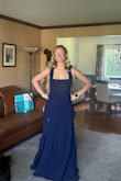 This dress is absolutely perfect for a wedding I am attending in a month. I have always bought from lulus for events that a nice gown is needed. This dress absolutely exceeded my expectations. I got the dress within a couple of days, it fit perfect, and it looks stunning. The fabric isn't super moveable so if you are scared it won't fit I would size down. Mine is a bit tight around the bust but I prefer it to be tighter so it works out perfect. - Kylei O.
