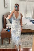 I love this dress. It fits so well and is a very comfortable material. It arrived very wrinkly, but it'll be easy to steam. Love the lace detail and print - reminds me of Reformation. - Lauren F.