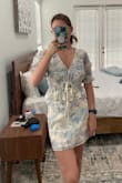 This set is so cute. The fabric and texture is beautiful. When the top arrived, I thought it was too big, but then I realized the strings can be pulled to scrunch the waist. Can't wait to wear this set! - Lauren F.