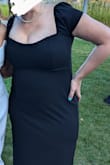 It worked well for a black-tie wedding. I was 12 weeks postpartum and breastfeeding so finding something to fit my bust was tricky. This dress has the stretch I needed while also containing my breasts well. The shoulders can be capped or drop onto the arms. - Christina Q.