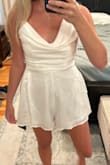 It is a true small. No stretch. Will be great for my couples shower! - Bailey H.