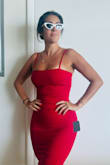 This dress is the best! I love the color and the fit! It is little tighter if your hippier like me but fits like glove. - Devon E.