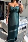 This dress was perfect for a black tie wedding. comfortable. I did not feel like I needed to pull up the dress at all. I was able to wear strapless bra with it. Lovely dress. - Nicole B.