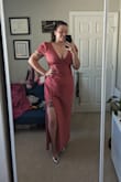 I ordered this for an upcoming wedding and it fits exactly how I'd hoped. The material is a really lovely colour and has a great feel. Also I was worried that kind of material and cut would show of a bit of my stomach pouch but actually it's super flattering! Oh also I have a larger bust and usually struggle to fit them into ANYTHING without them spilling over but this dress had no problems keeping the girls in and also held them up quite nicely. - Rebecca W.