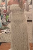 This dress is really cute. The material is not thick enough to suck in to compliment curves. In these pictures, I'm wearing a very good set of shapewear. Just wanted to offer a realistic picture- 5'5, 200lbs, ordered an XL - Lauren G.