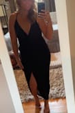 Absolutely love this dress!! It fits super comfortably, it's stretchy and flattering! I've had two kids and I don't like to wear anything tight that hugs my stomach area and it's perfect! There's a skirt under the part that's attached so it's not a slit straight to the top and you can sit comfortably in it as well as dance. I danced around for a minute or two to confirm it was going to be comfortable and family appropriate lol - Kyrstin G.
