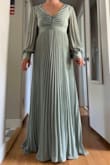 When I tried this dress on it actually made me feel larger than I am. I think the type of dress works for some but it just didn't work for me. Loved the color though. - Jordan K.