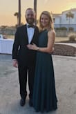 I absolutely love this dress! It's been a repeat for weddings for me! I normally wear XS or S originally ordering the XS, but the rib cage/torso is very tight. I ended up exchanging for a small and it fits like a glove. The dark green is gorgeous in person. It's been perfect for the two winter weddings I've worn it to. I love that the straps are adjustable and didn't have to have them taken in. I wore about 2.5ish inch heel and it just grazes the ground for someone who is 5'6. I highly recommend this gown for any semi-formal or formal event. It pairs great with a statement necklace since the front is so simple! - Alison D.