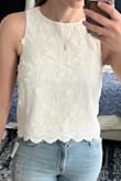 Very cute. Looks good with jeans. Good material not see through! Was worried bout this with the white but it is perfect! - Alethea C.