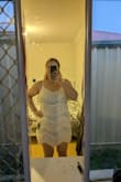 Very short, even on me as a shortie, but I love it! It fits well, covers all my lumps and bumps, beautiful dress - Cassandra L.
