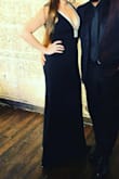 The dress really defines body curves. The fabric is comfortable - stretchy like. The bust area [has a] back clip - no more than a 36" bust. It fits just exactly for a 34-36 wide bust. Everything else is fitted down your hips. - Orquidia H.