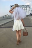 I ordered this for my bachelorette party and then to depart from our wedding reception. It's the perfect flirty white dress for a bride to be! I'm all about a simple dress with a statement back. It super comfortable and light weight. I wore a backless sticky bra and it worked perfectly. I loved the texture fabric too. - Alison D.