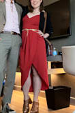 Okay! So the dress isn't as vibrant in person as it is online, but that's my only con. It just is a very flattering shape and draped nicely. It can get wrinkled but steaming it before the event and pulling the skirt down some before sitting kept wrinkles at bay. PS. gold belt and shoes are also from Lulus! - Kelly R.