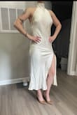 I purchased this dress for my elopement and it is so pretty! My only complaints are that the fabric lays weird on the butt due to how it was sewn. The fabric is also not very thick and somehow the seam came apart in-between me trying it on once and me wearing it for my elopement. Otherwise, it was comfortable and photos came out well! Side note that it is not as white as the photos, but I think the color is perfect. - Emily C.