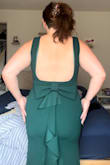 The material of this dress is amazing. It's nice and thick so it holds everything in. I have a pretty big bust and I don't need a bra with it. Plus it's absolutely gorgeous! The color, the details on the back, it's just so perfect! 10/10 would recommend - Taylor L.