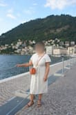 I bought this dress to wear on vacation in Lake Como, Italy because I wanted to look nice but still be comfortable in the hot weather. It was perfect for that purpose. The fluttery sleeves cover my upper arms, which I wanted, but still are loose enough to let the breeze come through. The waist tie gives shape while still feeling loose enough everywhere else. The only problem I have with this dress is that it bunches in the middle when I sit down. Maybe more of an A-line cut from the waist down would be better since the linen fabric is more stiff than cotton or some other more flexible fabric. But overall, love it! - Aisha S.