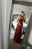 Typically with my hourglass figure, if I don't wear a tight dress, my waist gets lost and I lose my shape. This is the first dress I've purchased which has texture and a unique cut that didn't drown me. It hugs my waist nicely and the flowy skirt adds the femininity I've been looking for. I always want to show off my figure,  but I don't always want the bombshell "Jessica Rabbit" look. The only issue I had was the top, but that's my issue. My breasts are too small for the top, so there was a gapping issue on the sides by the armpits. I got it slightly altered and it fits like a glove now. I am 5'9 wearing 2.5 inch heels in the picture and it's dusting the floor. Without heels, it drags on the floor for me-so definitely tall girl approved. - Rebecca A.