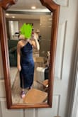 I was really excited for this dress, but it fit like a paper bag. When wearing the neckline like the model, the fabric bunches up around the shoulders. - William D.