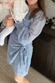 I wore this to a christening. It felt great on. The sleeves were a little long. - Marina B.