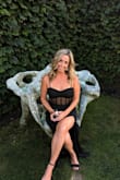 The small was a little snug and I returned it for the Medium which was absolutely perfect. I had to hem it as I'm quite short. I wore it for a black tie wedding and felt beautiful in it. Lots of compliments. A non-boring black dress with class. - Chelsea D.