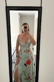 So I'm normally an XL and after reading all the a little large reviews I decided to go with a large instead. I got lucky because it was a perfect fit. So idk what to really say on sizing. So here are my stats to maybe help you. 5'11" (196lbs) and it touched the floor without dragging. I have a 36D chest and while it was a great fit I am going to make a slight alteration to help cover the cleavage a bit for the event I'm attending. My waist is 34" and she was snug. Like form fitting but don't you dare gain another pound. My hips is 46" and it fell nicely. I sometimes struggle with dresses making me look like a box but this one was perfect. :) hope this helps. - Nikki K.