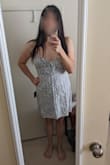 The dress is a tiny bit tighter than I expected, but wouldn't exchange it. The color looked a bit more purple/lavender coloured online than compared to real life. In real life, it is very blue, and I'm not a big fan of blue. I work with graphics/photos, so my computer screen is colour calibrated, so that shouldn't be a monitor issue. The dress is very short, and the breast coverage is a bit on the skimpy side, and is cut too low. I think they should have also made the front a tie front, with a hole under the tie. I'm only a B cup, and it is super easy to flash someone when you're sitting down in this dress. One of the photos I submitted is comparing it to a lavender coloured Lulus dress for comparison on the colours. (Please ignore the door behind me, it's a half sized door for the attic.) I won't be returning it because now Lulus charges a restocking fee on returns, but not too happy with my purchase. - Sunny W.