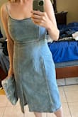 I saw this dress and wanted the dark wash immediately. I got the light wash in the mail, but I liked it too, a little more casual but still cute so kept it. I'm typically a size 6 but wondered, looking at the size chart, if I should have gone with the 8. Once I had on the 6, I knew it was the right size. I'm 34ddd and 28 waist, and with a strapless bra, it was snug up top but felt more secure than tight, no issues with the zipper. Through the torso, it was fitted but also not tight. I sat in it for a few hours and then got dessert and still felt it to be a little roomy in the middle, which means I'll wear it more often! This was just my try-on photo, but I wore it out with a brown cropped sweater and brown sandals. - Andrea W.