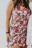 My best friend's bridal shower theme was floral so this was the perfect dress. Adorable off the shoulder. Fit perfectly. I got so many compliments! Good quality, not too short. - Alexis M.