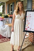 Wore this dress for my bridal shower and it was perfect! Received so many compliments throughout the day and would highly recommend. I loved how the dress could be adjusted via the tie in the back as well. - Megan F.