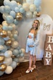 This dress was perfect for my baby shower!! It was so cute. It made me feel so girly and pretty!! I ordered a small and it fit perfectly! - Jess S.