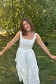 I wore this for my engagement party and it was so perfect. It was a hot and humid day. I stayed comfortable, and the dress appeared perfect all day! Comfortable to wear and fit great! I do recommend a sticky bra; the corset fabric would be too sheer in the sun! With a bra, no problems:) - Madilyn S.