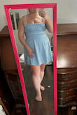 Compared to the other XL dresses I have bought, it's a little tight on the bust. Still a super cute dress though and I love the pops of white. It's a great length and love the shade of blue. - Katie W.