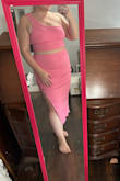 It's a comfortable skirt and top but I wish there was more support or thicker fabric on the skirt to give more coverage. The slit is a nice addition. The pink is cute but if I had a tan it might be more flattering. - Katie W.