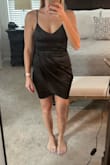 I already have this dress in hot pink that I bought for a bachelorette party. I loved it so much that I decided I needed it in black because who doesn't need a LBD. It's very comfortable but a little tight. If you have big boobs you might need to go up a size. I'm pretty small-chested chested and it was tight up top for me. - Lauren L.