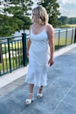Bought this dress for my engagement party and it fit perfectly! So comfortable and cute. I received many compliments. Would recommended for any bridal event! - Sam B.