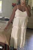 I can understand why this dress isn't flattering on a lot of people. But I've been fluctuating in weight and right now I'd say this dress flatters me. I also have a larger bust. There is a bit of extra fabric on the sides but I can live with that. I bought the white and sage green and get complimented wearing both! - Christine N.