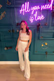 I wanted a two-piece that was a little more than just basic white for my bachelorette, and I absolutely loved it! Received so many compliments! The only downside is the pant legs were a bit long so they got dirty being out and about, however it came out in the wash and would probably be fine with a taller heel/boot. - Krista L.