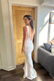 Absolutely love this dress, fit perfectly, modest in the front and still sexy in the back. Material was very high quality would recommend Lulus to others looking for a affordable wedding. - Christine