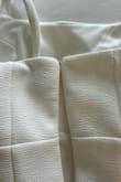 It's out of the return window. When I went to wear it and zip it up for our wedding reception 3 months after our wedding ceremony, the zipper broke. The dress fit perfectly but wouldn't zip over the seam and broke! I'm hoping I can get a refund! - Ashley S.