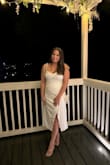 This dress is gorgeous and so comfortable! The stretchy fabric in the back and adjustable straps really helped! Wore this on my bachelorette trip and couldn't ask for a more perfect dress! I got a Large and it fit like a glove. If in between sizes, I'd suggest sizing up! - Julianna H.