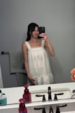 Bought this to get ready in for my wedding day. It was comfy and easy enough. It is see through, so you'll need to have something under. - Paige F.