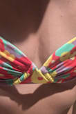 This doesn't lay flush on the chest, it's really awkward fitting and gapes when you are standing, let alone swimming. It doesn't matter how you tighten the straps or tie the suit. Unfortunately, it was final sale. Usually love my Lulus suits, but this was a bad design for a swim top. Won't ever wear as it will lead to a flashing incident. - Hanifa A.