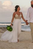 I absolutely loved this dress! I wore this for my beach wedding in Mexico in January. It was so perfect! Anyone looking for a gorgeous flowy dress that's somewhat simple and beach appropriate this one is for you! I had to have a few inches of length taken off and the straps shortened a bit, but after those minor alterations it fit like a glove! - Jenna K.