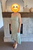 This dress is super flattering and I received lots of compliments when I wore it as a wedding guest.  Be careful with the lace though, it does snag/get caught on things easily. - Claire E.