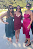 I love this dress! The color is vibrant and the material is very good quality. It has a bit of weight to it, not heavy by any means, but a weight that comes with a quality piece. This dress would be flattering on most any body type. Can't wait for an excuse to wear it again. - Jessica R.