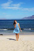 I loved this dress - very comfortable and versatile! I ordered it to wear on my honeymoon as a day trip outfit with sneakers but could wear a swimsuit underneath too. If I had more time, I would have returned and ordered a small though as it runs a little large. The material is very soft but a little clingy and unforgiving - you could see all the bathing suit lines underneath it. Still loved it though because it was so soft and felt great on! - Erica H.