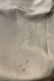 Definitely appears long on me being 5'3". It fits my boobs right. I'm a 34C, but I got a dress in the mail with black marks. - Kacie H.