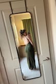 I ordered a medium and I think I could have gone down to a small. I'm 5'5 and I felt like it was long on me, not so long that I couldn't have made it work but I'm a 34B and I just felt like there was too much bunching and space around the top. Super comfortable and super stretchy though. The back is also so cute. I know it's supposed to be a halter top but I changed the straps around a few different times, I tried crisscrossing and tying it in the front, and that helped tighten it a bit. - Siena M.