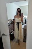 The dress is well made and very pretty. The zippers ok. I'm usually a small, but felt like the XS would've been better. There was room at the waist and bust for me. - Luna C.