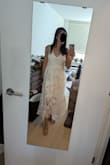 Very pretty dress. Like some others said, the string's material can irritate skin. This dress fits my small bust well. I'm going to sew in my own bra inserts. - Luna C.